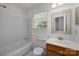 Bathroom featuring a sink, vanity, and shower/tub combination at 10600 Four Mile Creek Rd, Charlotte, NC 28277