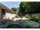 Serene backyard patio featuring elegant pavers and a comfortable outdoor seating area at 1114 Urban Pl, Charlotte, NC 28209