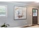 Cozy entryway featuring neutral walls and striking abstract artwork at 1114 Urban Pl, Charlotte, NC 28209