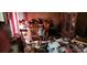 Cluttered dining room with a table, chairs, and various items strewn about at 1116 Bryce Ave, Salisbury, NC 28144