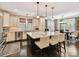 Bright, open kitchen featuring a large island, stainless steel appliances, and a dining area at 1118 Yale Pl, Charlotte, NC 28209