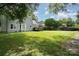 Enjoy the expansive backyard with a large lawn, ideal for outdoor activities and gatherings at 12411 Herdon Ct, Charlotte, NC 28277