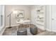 Bright, well-organized home office with contemporary decor and ample natural light at 12411 Herdon Ct, Charlotte, NC 28277