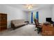 Neutral bedroom with futon and desk, offering a comfortable workspace at 1252 Wendy Rd, Rock Hill, SC 29732