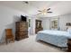 Spacious bedroom featuring carpeted floors, a ceiling fan, and natural light from two windows at 1252 Wendy Rd, Rock Hill, SC 29732