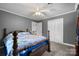 Grey bedroom with a ceiling fan, double closets, carpet and a full bed at 1252 Wendy Rd, Rock Hill, SC 29732