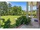 View of the large lawn and landscape from the beautiful columned covered front porch at 1252 Wendy Rd, Rock Hill, SC 29732