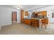 Traditional kitchen with wooden cabinets, stainless steel appliances, and breakfast bar seating at 1252 Wendy Rd, Rock Hill, SC 29732
