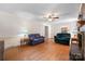 Spacious living room with hardwood floors, wainscoting, and comfortable seating at 1252 Wendy Rd, Rock Hill, SC 29732