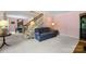 Inviting living room with stairway, featuring carpet and a comfortable sofa at 1252 Wendy Rd, Rock Hill, SC 29732