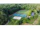 An aerial view of community recreational facilities: pickleball, volleyball, soccer and lush greenery at 132 Ragsdale Trl, Mooresville, NC 28117