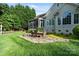 Outdoor patio with dining table and chairs, perfect for enjoying meals and outdoor gatherings at 132 Ragsdale Trl, Mooresville, NC 28117