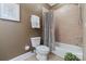 Cozy bathroom with a shower-tub combo and neutral-toned walls at 132 Ragsdale Trl, Mooresville, NC 28117