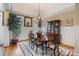 Dining room featuring wainscoting, chandelier, and a large wooden table with seating at 132 Ragsdale Trl, Mooresville, NC 28117