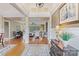 Elegant foyer with hardwood floors, wainscoting, and an open floor plan at 132 Ragsdale Trl, Mooresville, NC 28117