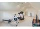 Spacious home gym area with treadmill, rowing machine, and plenty of room for workout equipment at 132 Ragsdale Trl, Mooresville, NC 28117