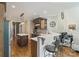 Charming kitchen featuring counter seating, a center island, and stylish pendant lighting at 132 Ragsdale Trl, Mooresville, NC 28117