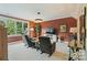 Cozy living room with elegant lighting, comfortable recliners, and a scenic outdoor view at 132 Ragsdale Trl, Mooresville, NC 28117