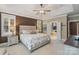 Comfortable main bedroom features a large bed and doorway leading to ensuite bathroom at 132 Ragsdale Trl, Mooresville, NC 28117