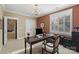 Inviting home office with a desk, large window, and ample natural light at 132 Ragsdale Trl, Mooresville, NC 28117