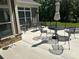 View of patio featuring neutral colored concrete and outdoor seating set at 1330 Millview Ln, Matthews, NC 28104