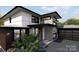 Contemporary home exterior with stone accents and a two-car garage at 138 Broken Arrow Rd, Statesville, NC 28677