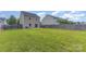 A large fenced backyard with a grassy area and stone patio at 1404 Waylon Ave, Gastonia, NC 28054