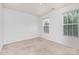 Cozy bedroom with plush carpeting and natural light, offering a relaxing retreat at 1404 Waylon Ave, Gastonia, NC 28054
