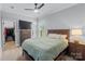 Cozy bedroom with a large window, TV, closet, and comfortable bed at 14116 Glaswick Dr, Charlotte, NC 28278