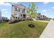 Lovely two-story home with a landscaped front yard and sidewalk leading to a welcoming neighborhood at 14116 Glaswick Dr, Charlotte, NC 28278