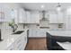 Stylish kitchen boasts modern appliances, custom cabinetry, and an island, perfect for cooking and entertaining at 14116 Glaswick Dr, Charlotte, NC 28278