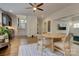 Bright dining area showcasing hardwood floors, round table, and open layout at 1427 Main St, Charlotte, NC 28204