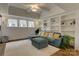 Cozy living room featuring custom built-ins and comfortable seating at 1427 Main St, Charlotte, NC 28204