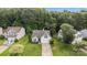 Aerial view of home and neighborhood featuring mature trees and well-kept lawns at 1445 Deer Forest Dr, Indian Land, SC 29707