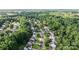 An aerial view of houses surrounded by mature trees in the Legacy Park neighborhood at 1445 Deer Forest Dr, Indian Land, SC 29707