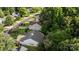 An aerial view of the home showcasing the roof and surrounding greenery in the neighborhood at 1445 Deer Forest Dr, Indian Land, SC 29707