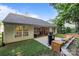 Charming backyard featuring a patio, built in seating and a beautifully landscaped area, perfect for relaxation at 1445 Deer Forest Dr, Indian Land, SC 29707