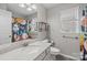Bathroom featuring a white vanity, decorative shower curtain, a window, toilet and neutral walls at 1445 Deer Forest Dr, Indian Land, SC 29707