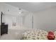 Bright bedroom with neutral carpet, ceiling fan, and attached bathroom at 1445 Deer Forest Dr, Indian Land, SC 29707
