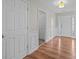 Welcoming entryway featuring beautiful wood floors, decorative molding and a view to the front door at 1445 Deer Forest Dr, Indian Land, SC 29707