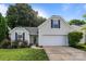 Charming single-Gathering home with a two-car garage, well-manicured lawn and beautiful landscaping at 1445 Deer Forest Dr, Indian Land, SC 29707