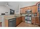 Updated kitchen with granite countertops, stainless steel appliances, and tile backsplash at 1445 Deer Forest Dr, Indian Land, SC 29707