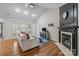 Bright living room featuring a fireplace and hardwood floors at 1445 Deer Forest Dr, Indian Land, SC 29707