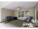 Covered patio with seating and ceiling fan at 1445 Deer Forest Dr, Indian Land, SC 29707