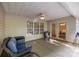 Covered patio with comfortable seating and ceiling fan at 1445 Deer Forest Dr, Indian Land, SC 29707