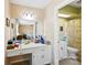 Main bathroom features a large mirror and connects to a second bathroom space at 1670 Robins Nest Ct # C, Gastonia, NC 28054