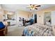View of bedroom with ensuite bathroom, closet, desk, and ceiling fan at 1670 Robins Nest Ct # C, Gastonia, NC 28054