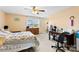 Bedroom with carpet, ceiling fan, desk, and window with blinds at 1670 Robins Nest Ct # C, Gastonia, NC 28054