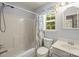Well-lit bathroom features a tub and shower combination and blue accents at 171 Highland Woods Ct, Denver, NC 28037
