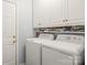 Laundry room with white cabinets, a washer, and a dryer at 171 Highland Woods Ct, Denver, NC 28037